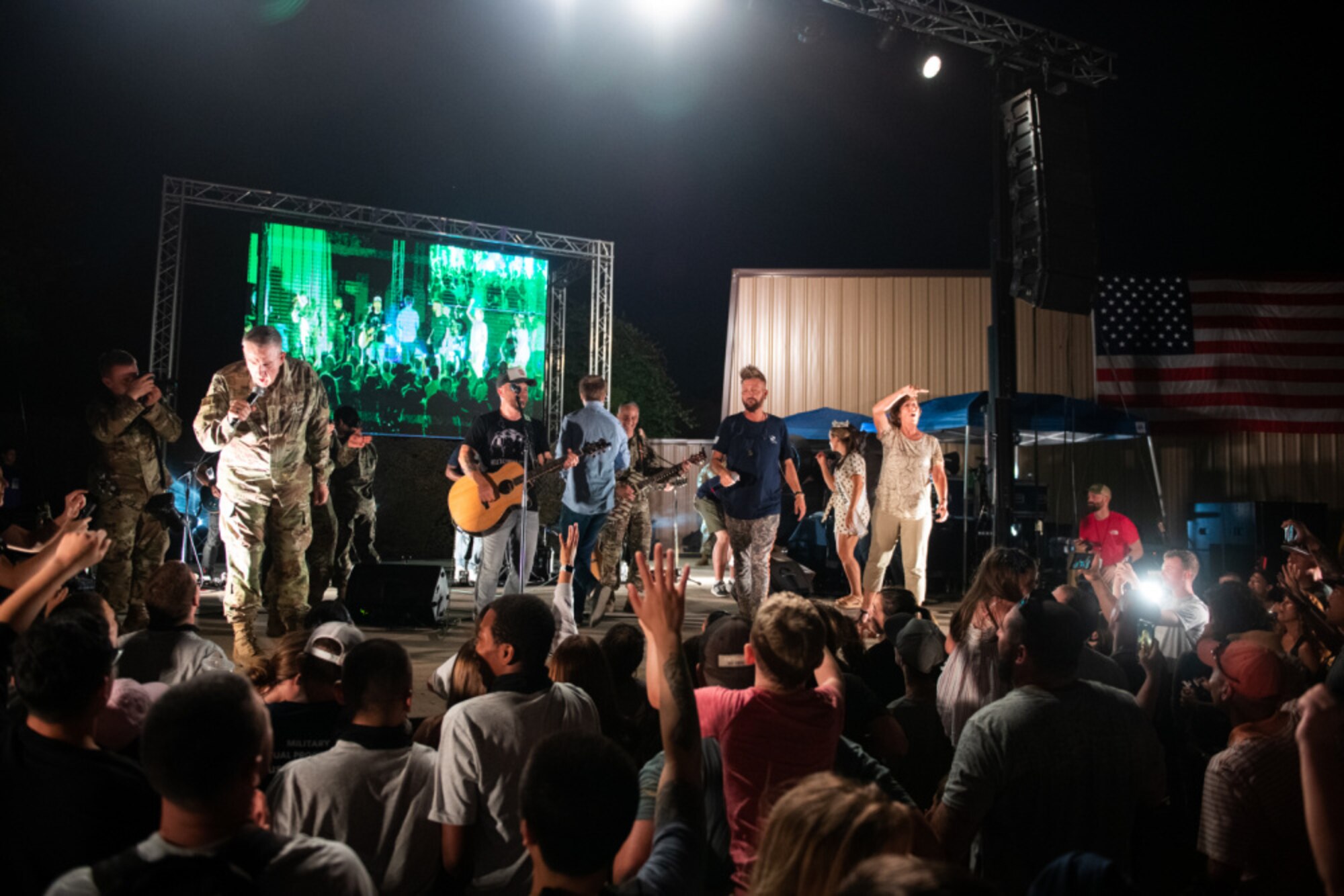 The USO group performs on stage at JBSA-Lackland.