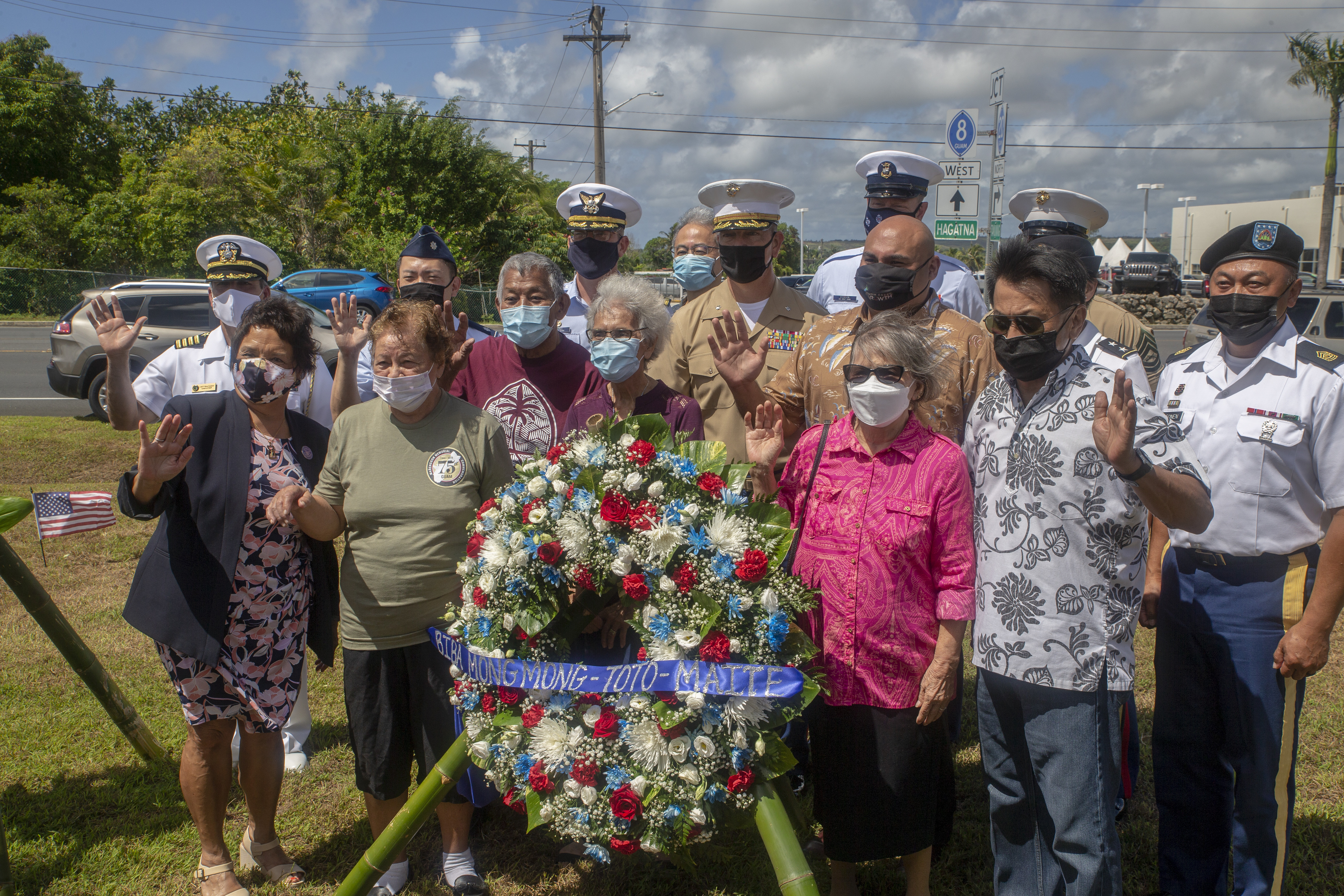 Marine Corps Base (MCB) Camp Blaz senior leaders pose for a photograph with other senior military leaders, Government of Guam officials and World War II survivors during wreath laying ceremony and memorial service at the 5th Marine Depot Memorial in Mongmong-Toto-Maite, Guam, July 8, 2021.