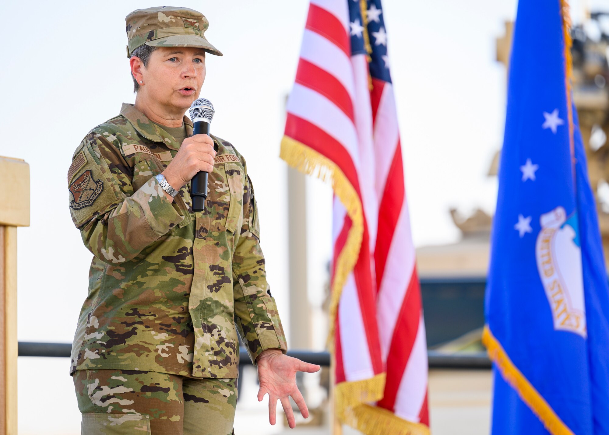Col. David Briggs, outgoing 378th Expeditionary Mission Support Group commander, addresses the crowd during the group change of command ceremony, Prince Sultan Air Base July 5, 2021. The 378th EMSG provides full spectrum support to the 378th Air Expeditionary Wing and joint partners, sustaining and defending forces to enable combat power projection in the region. (U.S. Air Force photo by Senior Airman Samuel Earick)