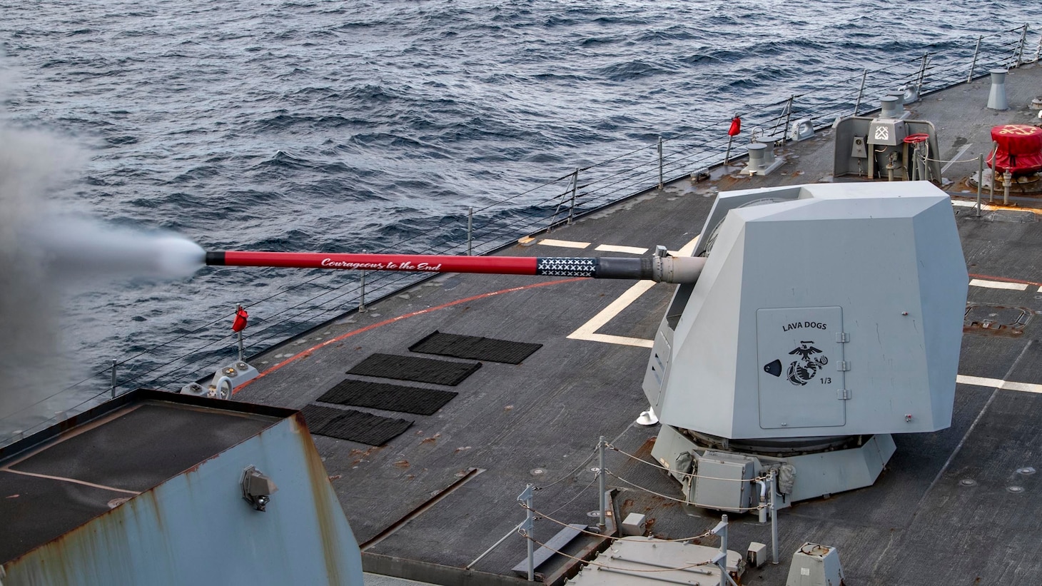 210707-N-HG846-1479 TASMA SEA (July 7, 2021) – The Arleigh Burke-class guided-missile destroyer USS Rafael Peralta (DDG 115) fires its 5-inch gun during exercise Pacific Vanguard 2021. Pacific Vanguard, an exercise involving U.S., Australian, Republic of Korea navies and Japan Maritime Self Defense Force, is designed to strengthen maritime operations in the multilateral environment. (U.S. Navy photo by Mass Communication Specialist 3rd Class Daniel Serianni)