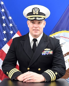 Studio portrait of CDR Kyle Hickman