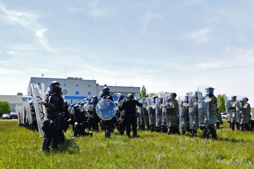 U.S. Army and Air National Guardsmen participate in a Civil Disturbance Unit training event with Capitol Police at the Park Police training grounds in Washington, D.C., April 27, 2021. Since January, Army and Air National Guard units from around the country have provided ongoing security, communication, medical, evacuation, logistical and safety support to capital civil authorities. (U.S. Air National Guard photo by Staff Sgt. Hanna Smith)