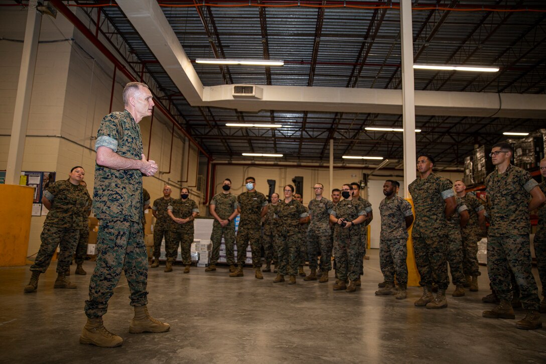The Assistant Commandant of the Marine Corps (ACMC), Gen. Gary L. Thomas, visited Marines and Sailors with 2nd Marine Logistics Group at Camp Lejeune, North Carolina, July 7, 2021.  During the visit, the ACMC spoke to members of the unit about medical logistics and transportation capabilities of the 2nd MLG.  Recently the 2nd MLG provided support to COVID-19 FEMA operations and completed the longest convoy in Marine Corps history. (U.S. Marine Corps photo by Staff Sgt. Wesley Timm).