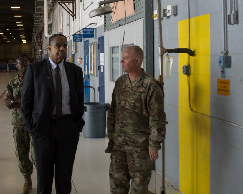 JOINT BASE ANDREWS, Md. - Col. Tyler Schaff, 316th Wing and Joint Base Andrews commander, speaks with Mr. David Harrington, president and CEO of Prince George’s County Chamber of Commerce, as they tour the Naval Air Facility Washington’s Fleet Logistics Support Systems One (VR1), during the Honorary Commanders Program quarterly visit at JBA, Md., June 25, 2021. The JBA Honorary Commanders Program encourages an exchange of ideas and experiences, as well as partnerships between key leaders of the base's surrounding communities, JBA commanders and Airmen. (U.S. Air Force courtesy photo)