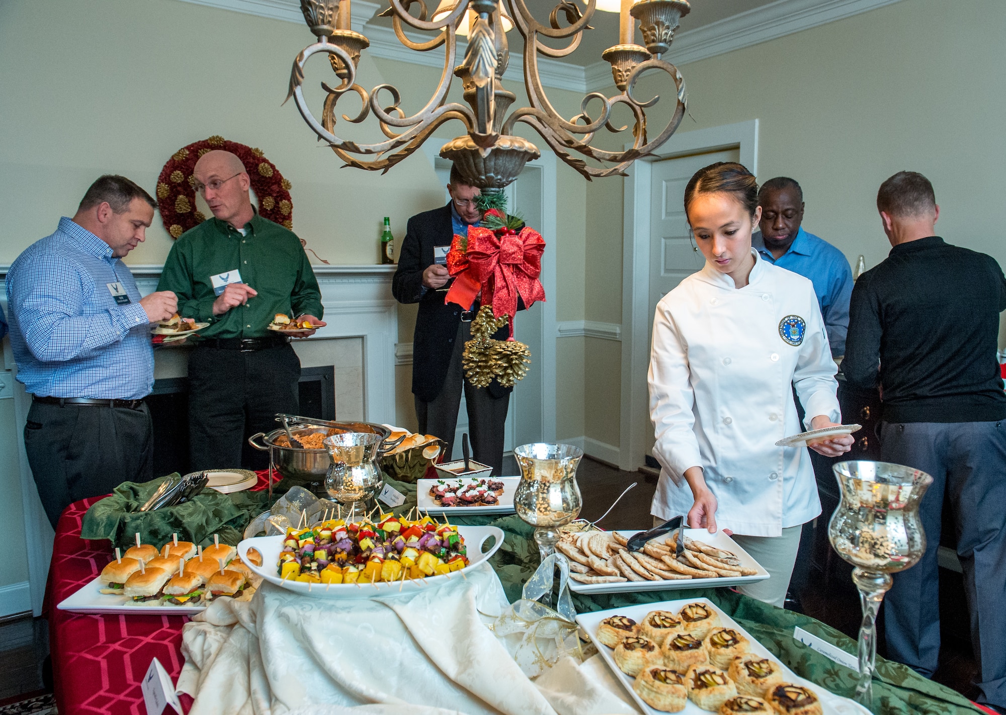 Staff Sgt Ma Antonette C. Cabantog tends to the buffet during a reception for MAJCOM vice commanders