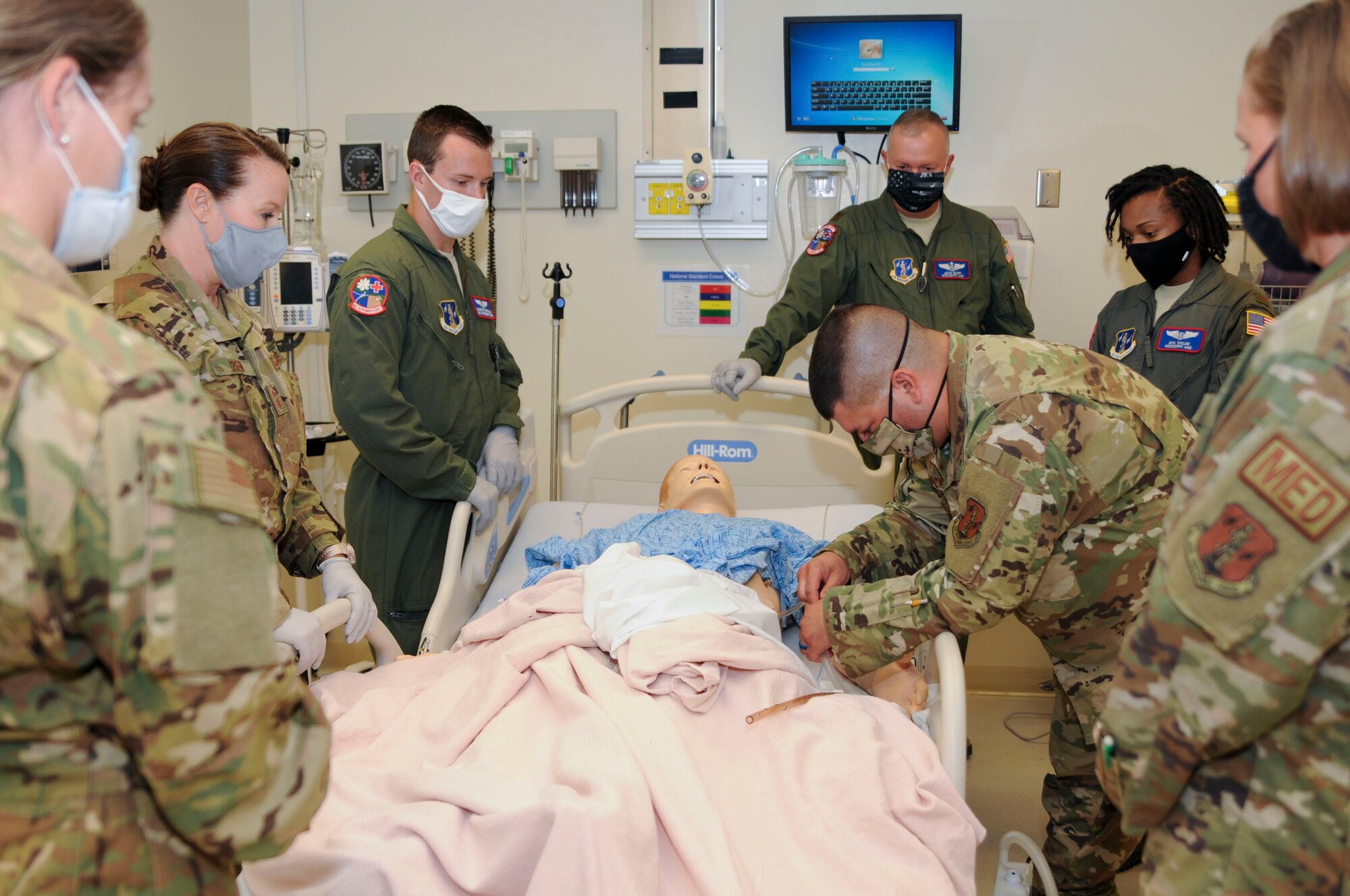 Lt. Col. Paul Boackle, a flight nurse assigned to the 183rd Aeromedical Evacuation Squadron, checks the suction tub on a simulated patient at Keesler Air Force Base in Biloxi, Mississippi, July 22, 2020. The 183rd AES visited the 81st Medical Group’s training and education facility, which provided them the opportunity to practice medical procedures. (U.S. Air National Guard photo by 2nd Lt. Kiara N. Spann)