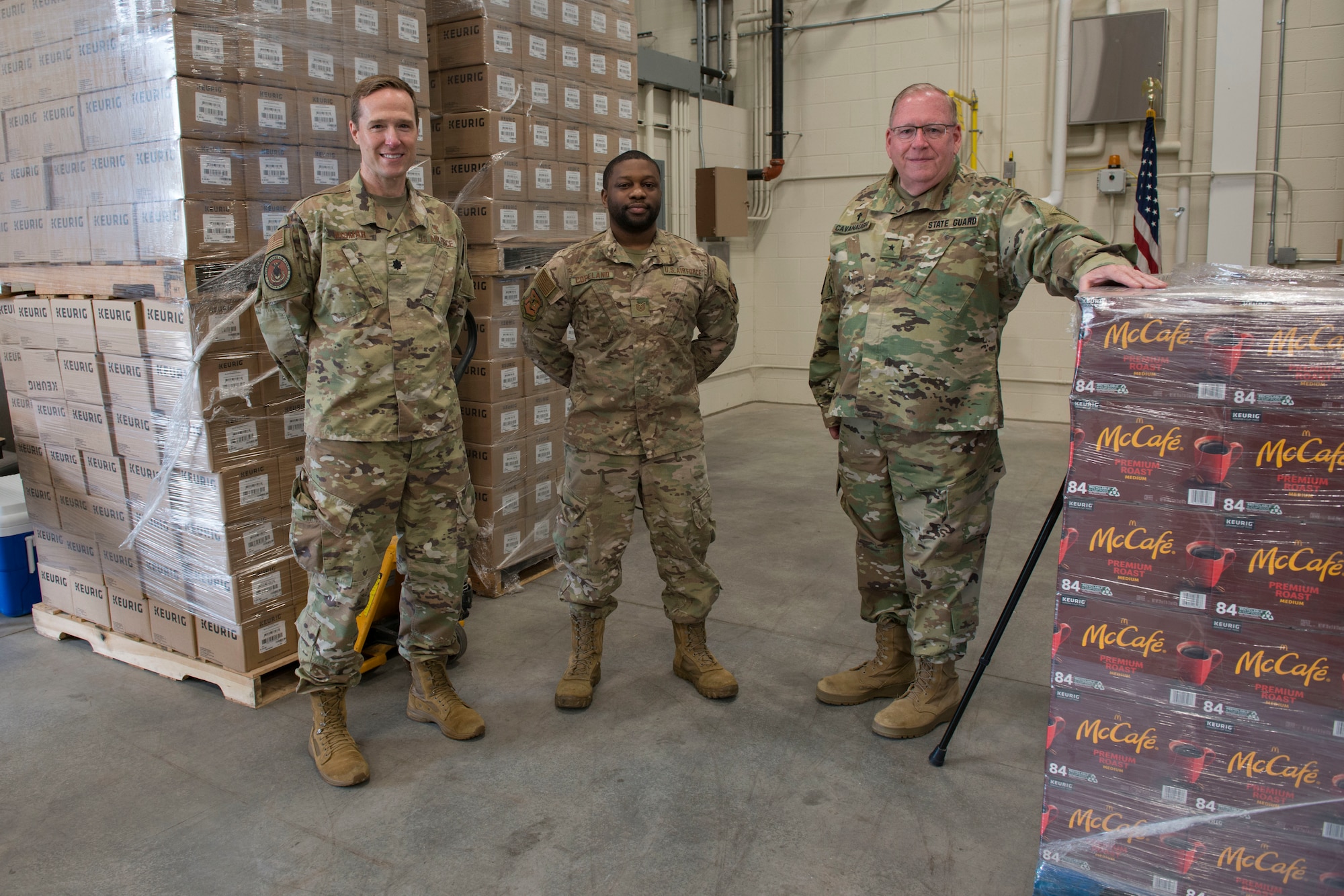 Retired Army Col. Kevin Cavanaugh, Connecticut State Militia Chaplain and former Army Chaplain,  accepts a donation of more than 1,400 pounds of coffee, June 14, 2021 at Bradley Air National Guard Base, Connecticut. The coffee was donated by Holy Joe's Cafe, a 501(c)(3) non-profit organization. (U.S. Air National Guard photo by Master Sgt. Tamara R. Dabney)