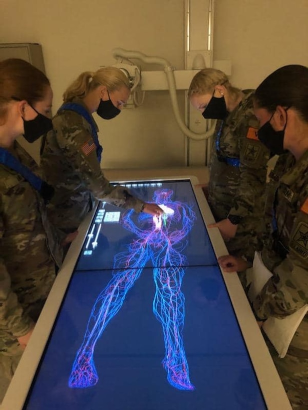 Students in the METC Radiologic Technologist program utilize the touch interactive 3D rendering system on the anatomage table to view the cardiovascular system.