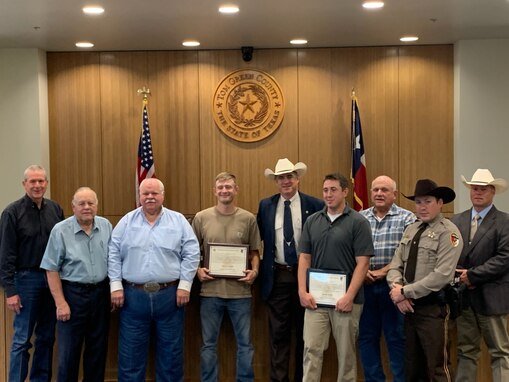 17th Security Forces Squadron police officer, Bradley Smelt, poses for a photo with members of Tom Green Country Sherriff’s Office in San Angelo, Texas. Smelt helped a Tom Green Country Sherriff Deputy in apprehending a fugitive, on May 18 and received the Sheriff’s Award for going above and beyond his duty as a citizen. (Courtesy Photo)