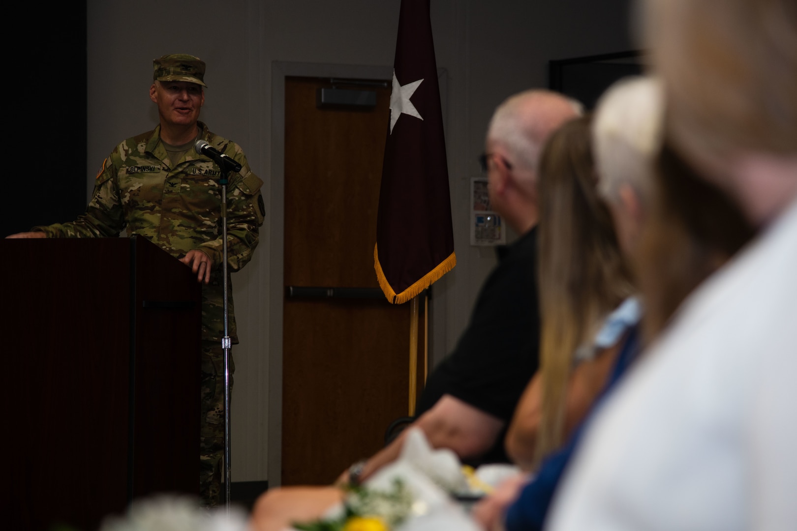 Incoming commander give remarks during a change of command ceremony.