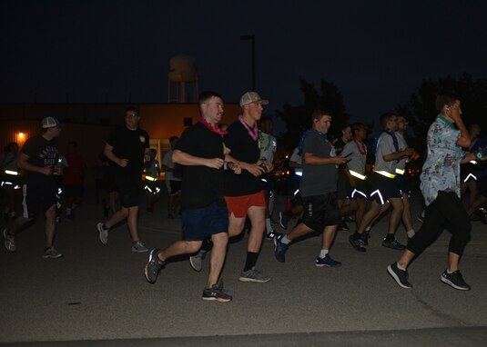 17th Training Wing members run at the NAZA-PA-LUAU Wing Fun Run on Goodfellow Air Force Base, July 9, 2021. Over 200 members participated in the fun run to bid Col. Andres Nazario, 17th TRW commander, farewell. (U.S. Air Force photo by Senior Airman Ashley Thrash)