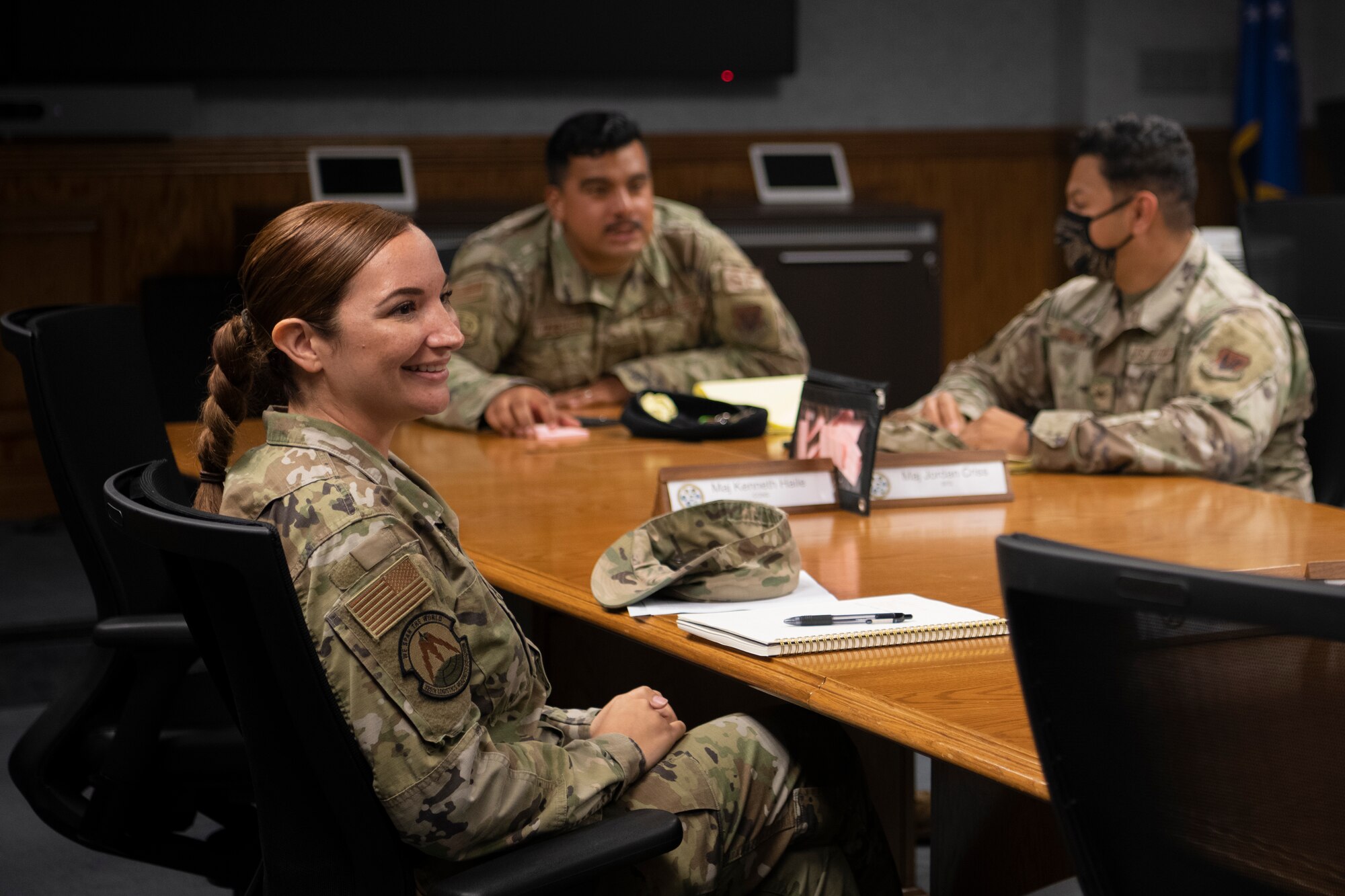 U.S. Air Force Tech. Sgt. Maria Cloherty, 325th Logistics Readiness Squadron equipment accountability noncommissioned officer in charge, left, converses with Airmen during a Hispanic Heritage Association meeting at Tyndall Air Force Base, Florida, June 30, 2021.