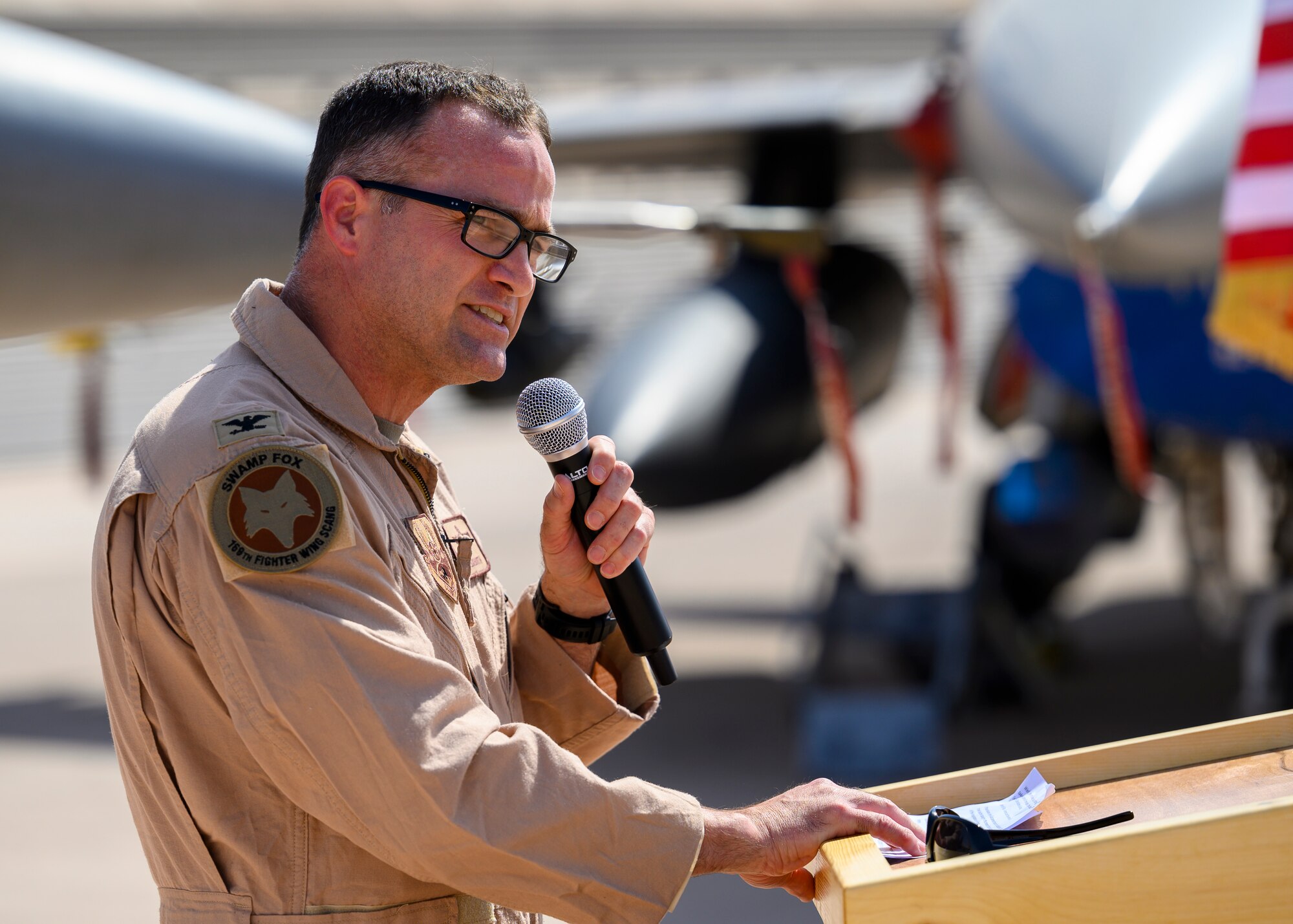 U.S. Air Force Col. Jason “Hollywood” Smith, incoming 378th Expeditionary Operations Group commander, addresses his unit for the first time during the group change of command, Prince Sultan Air Base July 5, 2021. The 378th EOG provides combat power projection in support of U.S. Central Command plans and operations. (U.S. Air Force photo by Senior Airman Samuel Earick)