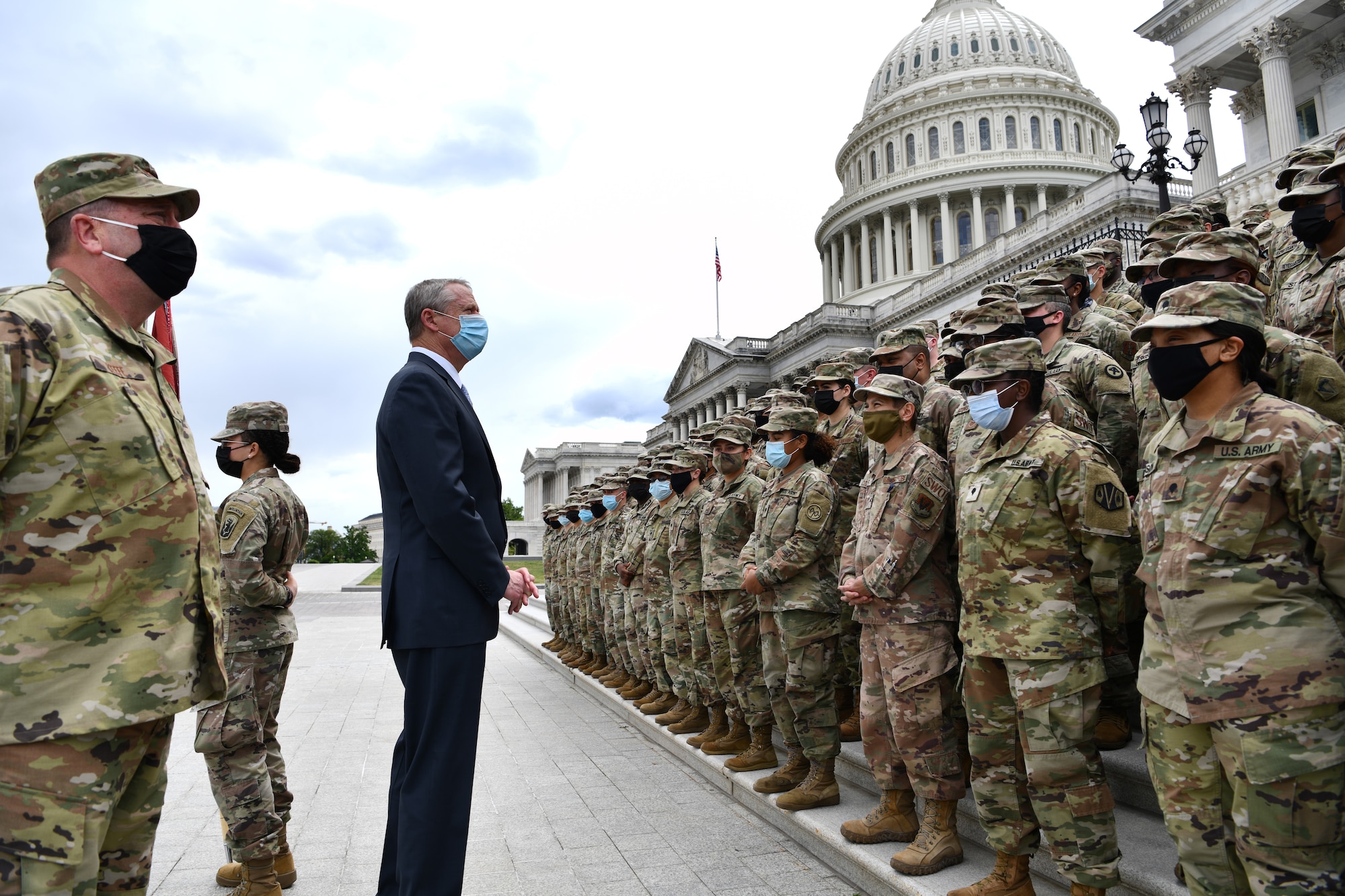 Massachusetts Governor Charlie Baker and Adjutant General of the Massachusetts National Guard Maj. Gen. Gary Keefe thank Soldiers and Airmen of the MA NG for their service in front of the United States Capitol Building in Washington, D.C., May 14, 2021. Since January, Army and Air National Guard units from around the country have provided ongoing security, communication, medical, evacuation, logistical and safety support to capital civil authorities. (U.S. Air National Guard photo by Staff Sgt. Hanna Smith)
