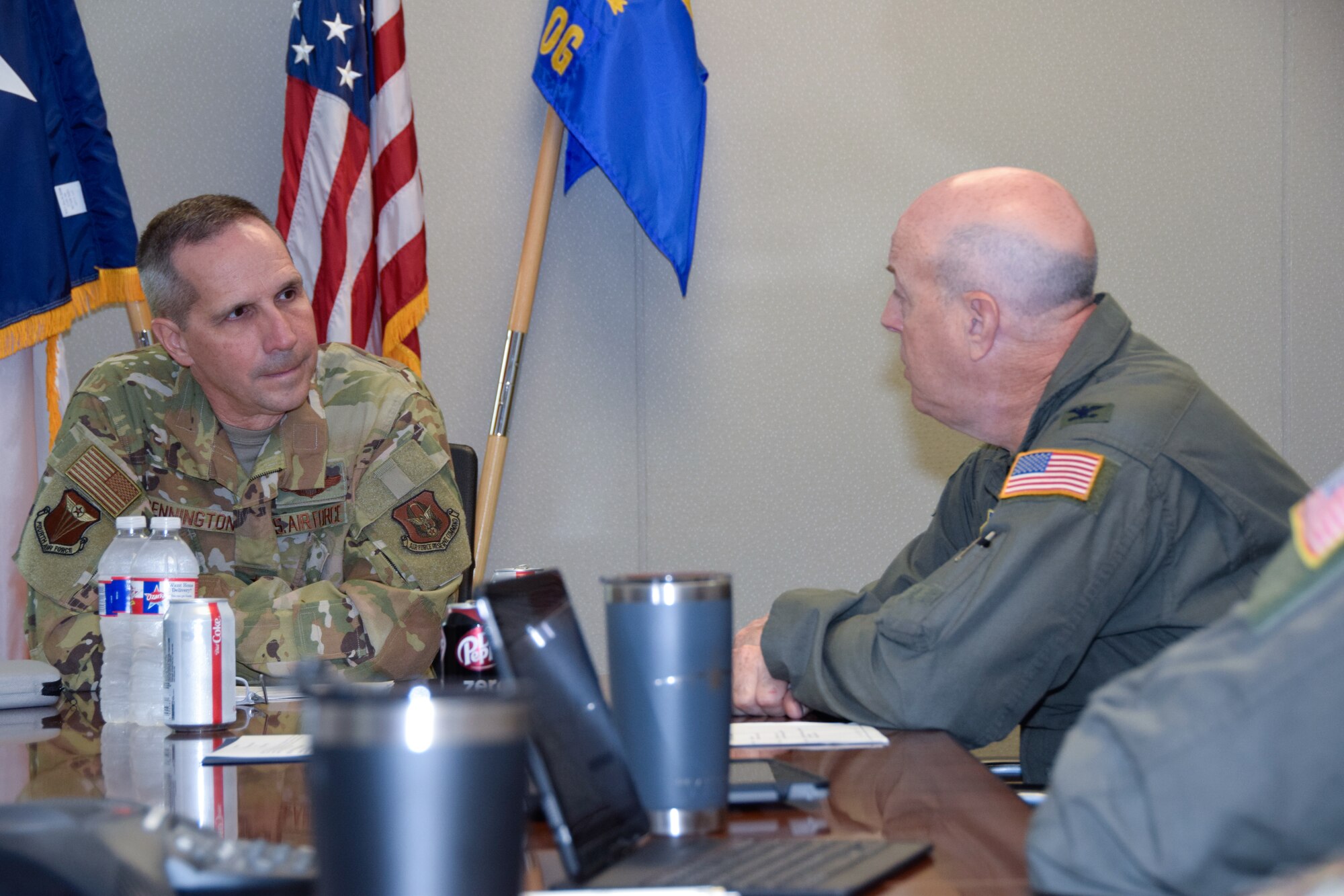Maj. Gen. Jeffrey T. Pennington, 4th Air Force commander, converses with Col. James C. “JC” Miller, 433rd Operations Group commander, at Joint Base San Antonio-Lackland, Texas, July 7, 2021. Pennington toured the 433rd Airlift Wing and discussed improvements to the C-5M Super Galaxy Formal Training Unit. (U.S. Air Force photo by Senior Airman Brittany Wich)