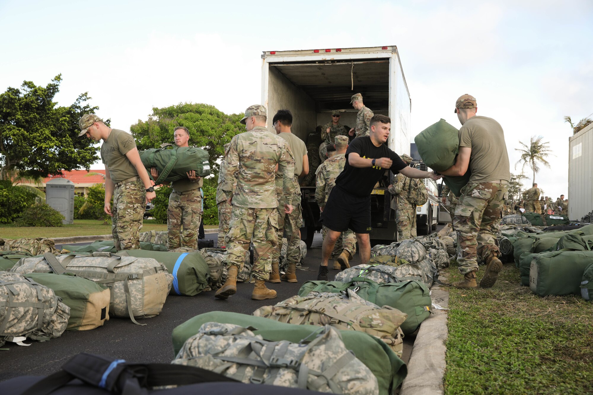 America’s First Corps Soldiers offload equipment for exercise Forager 21 at Anderson Air Force Base, Guam, July 10, 2021. Forager 21 bolsters the U.S. Army’s capability to rapidly deploy personnel and equipment in order to project power across a complex operational environment in the Pacific region. (U.S. Army photo by Sgt. David Resnick)