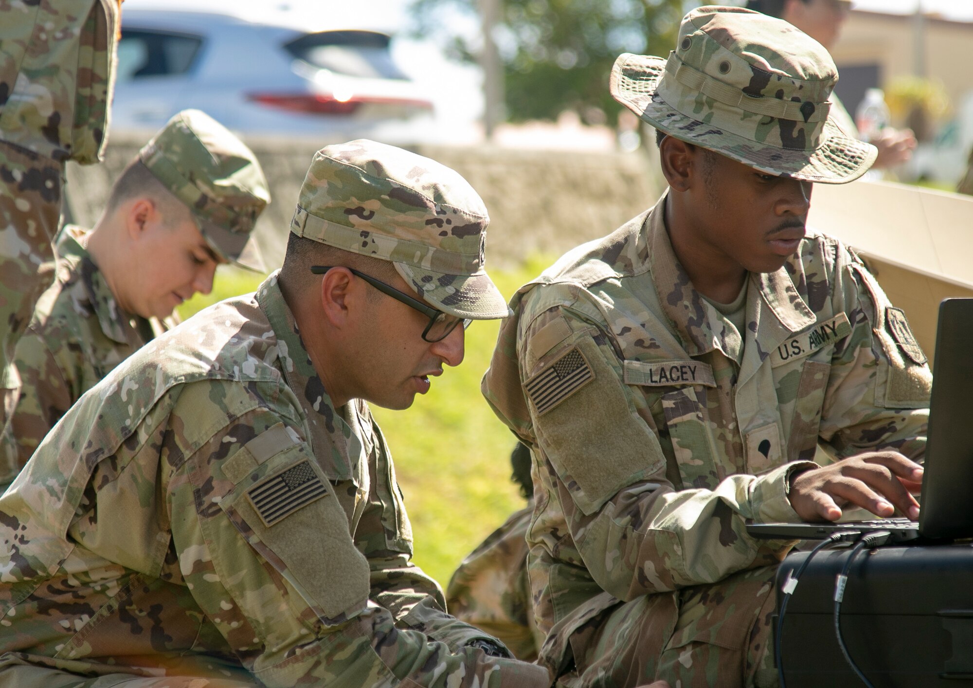 Staff Sgt. Karan Ratra, a satellite communication systems operator, and Spc. Michael Lacey, a multichannel transmission systems operator-maintainer, both from the 11th Signal Brigade, Fort Hood, Tx. set up a scalable network node satellite as part of exercise Forager 21, at Andersen Air Force Base, Guam, July 11, 2021.  Iterative realistic training like this exercise allows the U.S. Army to continuously innovate and practice our ability to dynamically respond with our joint partners, alongside our allies, and partnered militaries across all domains, whether it be land, air, sea, cyber or space.