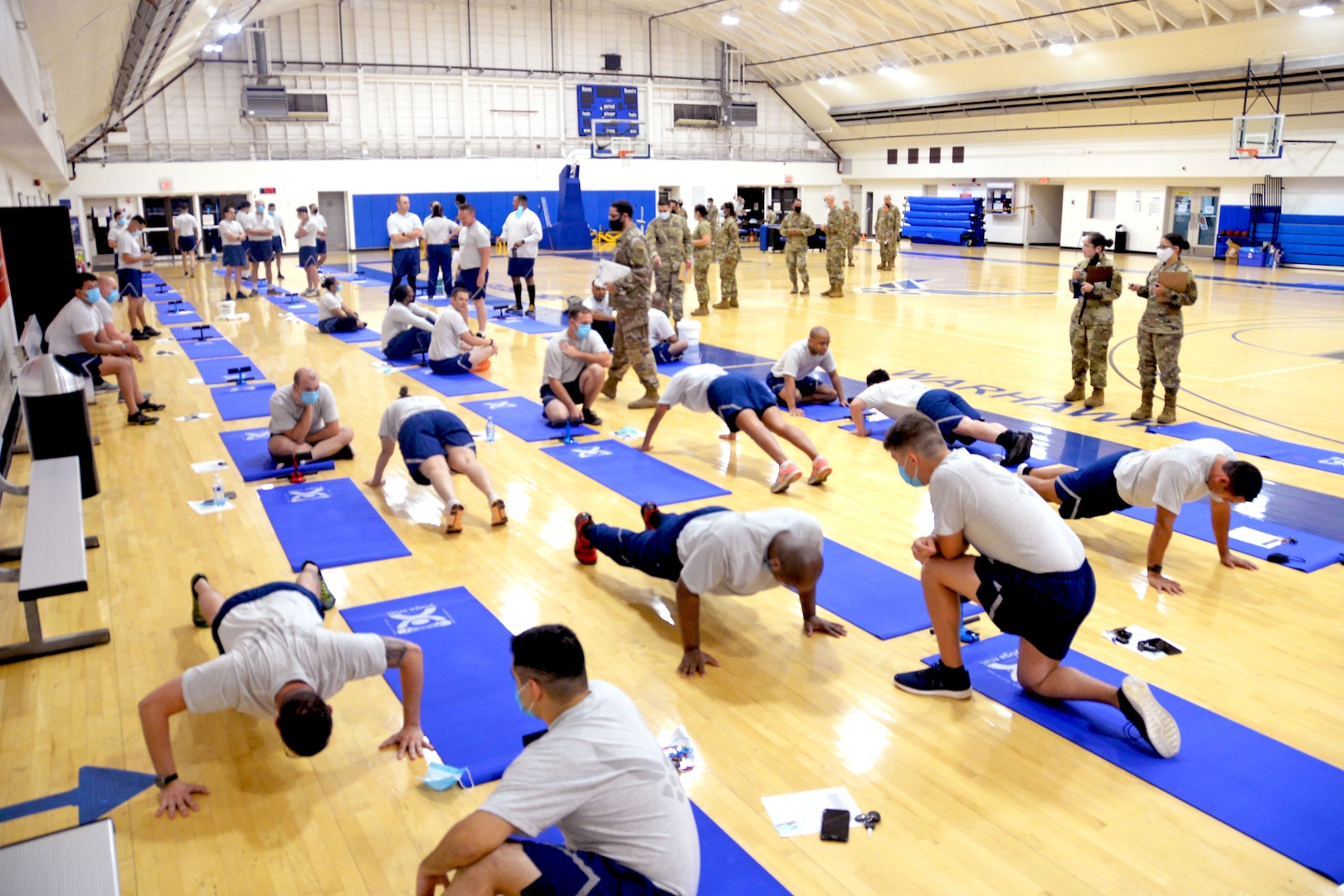 433rd Airlift Wing members participate in a fitness assessment July 10, 2021, at Joint Base San Antonio-Lackland, Texas. This is the first assessment in the wing since the onset of the COVID-19 pandemic. (U.S. Air Force photo by Tech. Sgt. Samantha Mathison)