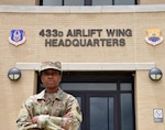 Chief Master Sgt. Takesha Williams, 433rd Airlift Wing Command Chief stands in front of the 433rd AW headquarters building on July 10, 2021 at Joint Base San Antonio-Lackland, Texas. Williams returned to the 433rd AW as she was previously assigned here as a functional administration manager in 2017. (U.S. Air Force Photo by Staff Sgt. Monet Villacorte)