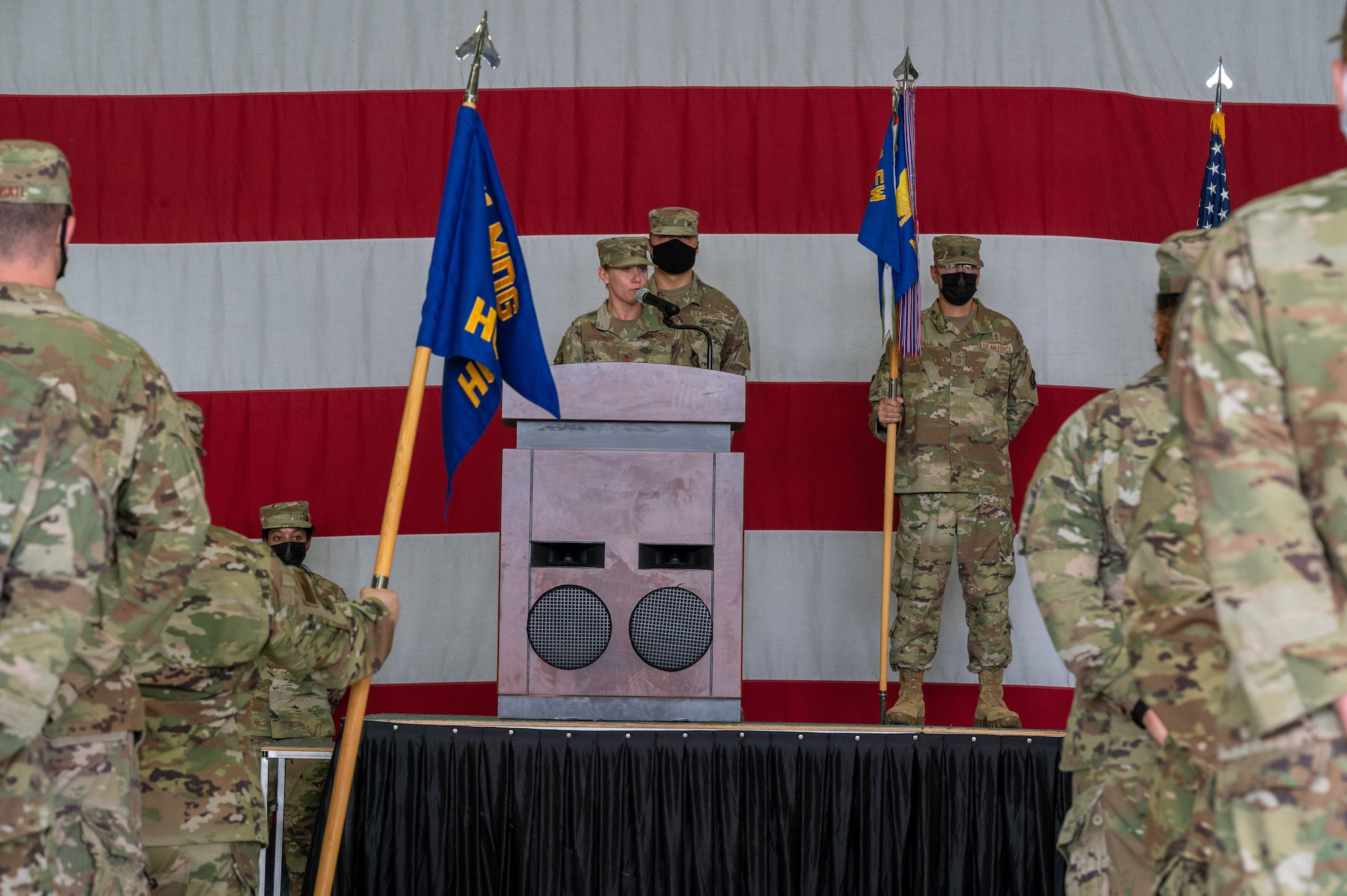Col. Jennifer Vecchione, 51st Medical Group commander, delivers remarks to her squadron during the change of command ceremony at Osan Air Base, Republic of Korea, July 12, 2021. The ceremonial passing of the guidon to Vecchione marks the official beginning of her command of the 51st MDG. (U.S. Air Force photo by Tech. Sgt. Nicholas Alder)