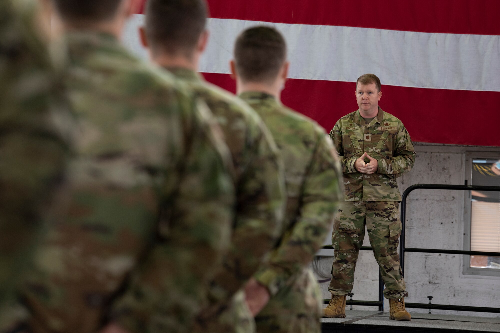 U.S. Air Force Maj. Kevin Walton, 52nd Maintenance Squadron commander, speaks to members of his new squadron after taking command of the squadron during an assumption of command ceremony July 9, 2021, on Spangdahlem Air Base, Germany.