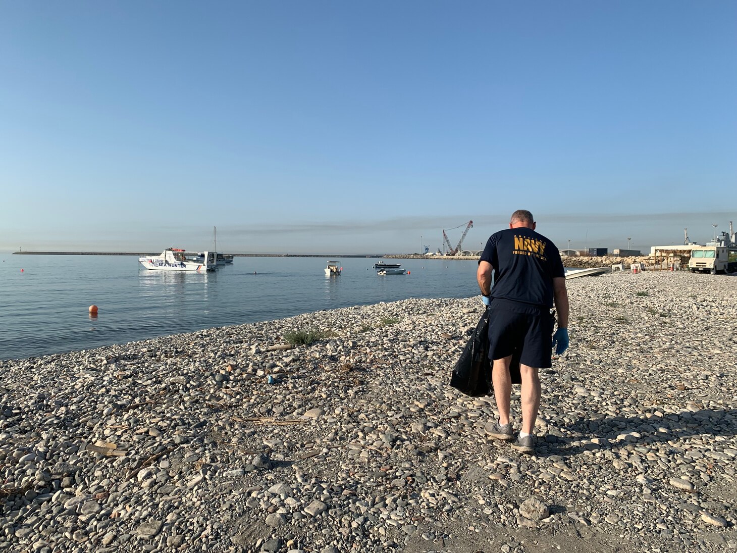 Sailors from Arleigh-Burke class guided missile destroyer USS The Sullivans (DDG 68) participate in a beach cleanup during a scheduled port visit in Limassol, Cyrpus, July 08, 2021.  The Sullivans is on a scheduled deployment with Carrier Strike Group 21. U.S. Sixth Fleet, headquartered in Naples, Italy, conducts the full spectrum of joint and naval operations, often in concert with allied and interagency partners, in order to advance U.S. national interests and security and stability in Europe and Africa.