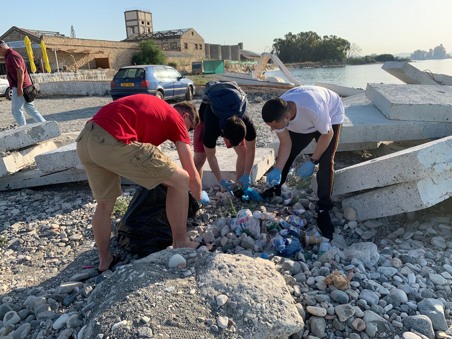 Sailors from Arleigh-Burke class guided missile destroyer USS The Sullivans (DDG 68) participate in a beach cleanup during a scheduled port visit in Limassol, Cyrpus, July 08, 2021.  The Sullivans is on a scheduled deployment with Carrier Strike Group 21. U.S. Sixth Fleet, headquartered in Naples, Italy, conducts the full spectrum of joint and naval operations, often in concert with allied and interagency partners, in order to advance U.S. national interests and security and stability in Europe and Africa.