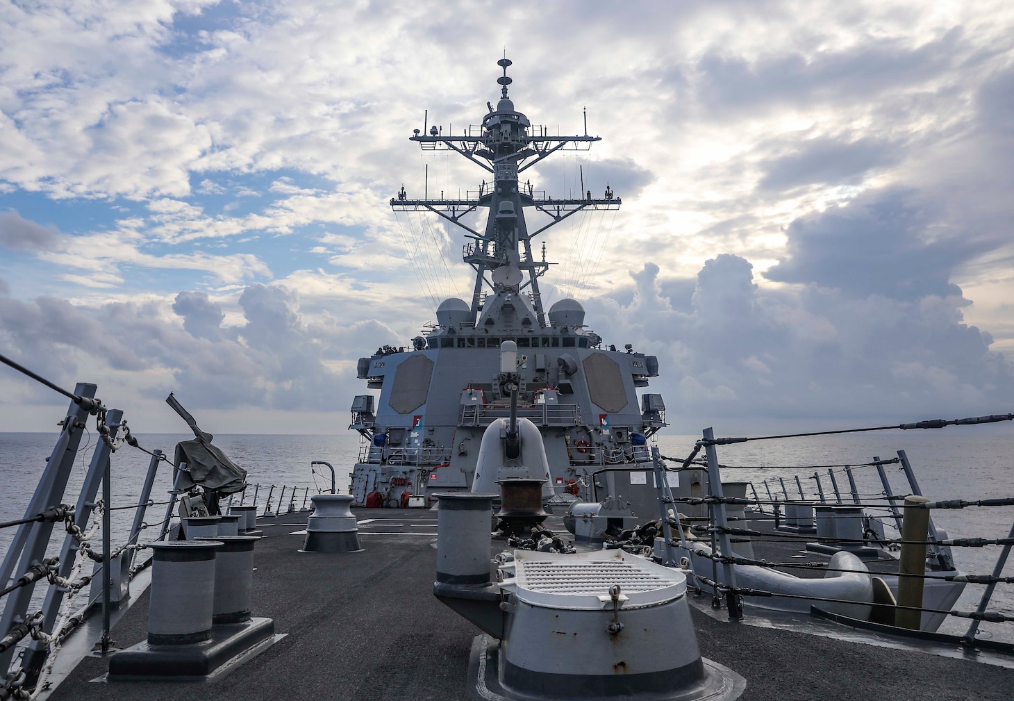 210712-N-FO714-1007 SOUTH CHINA SEA (July 12, 2021) The Arleigh Burke-class guided-missile destroyer USS Benfold (DDG 65) sails through the South China Sea while conducting routine underway operations. Benfold is forward-deployed to the U.S. 7th Fleet area of operations in support of a free and open Indo-Pacific. (U.S. Navy photo by Mass Communication Specialist 1st Class Deanna C. Gonzales)
