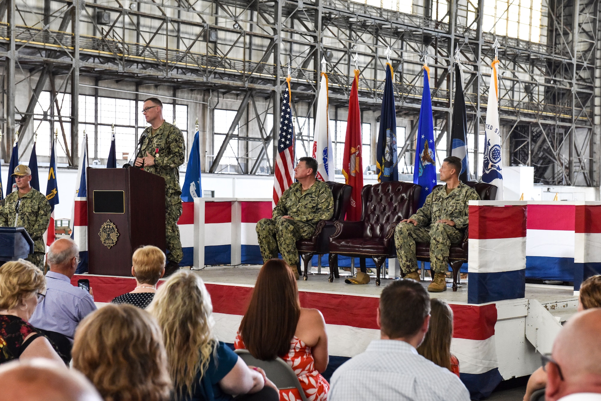U.S. Navy Capt. William R. Sherrod, outgoing commander of NSA Lakehurst, gives a speech to friends, family and colleagues during a change of command ceremony at Joint Base McGuire-Dix-Lakehurst, New Jersey, July 8, 2021. Sherrod was thankful and expressed his gratitude for his experience as Navy commander at Joint Base MDL. (U.S. Air Force Photo by Staff Sgt. Shay Stuart)