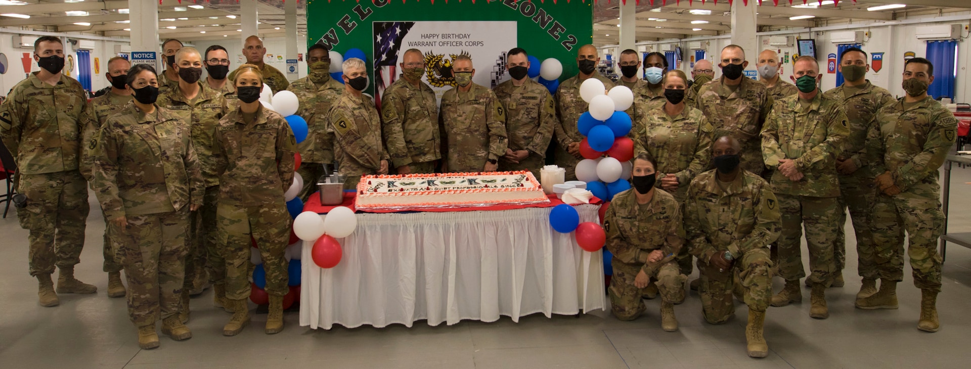 Task Force Spartan warrant officers celebrate 103rd birthday