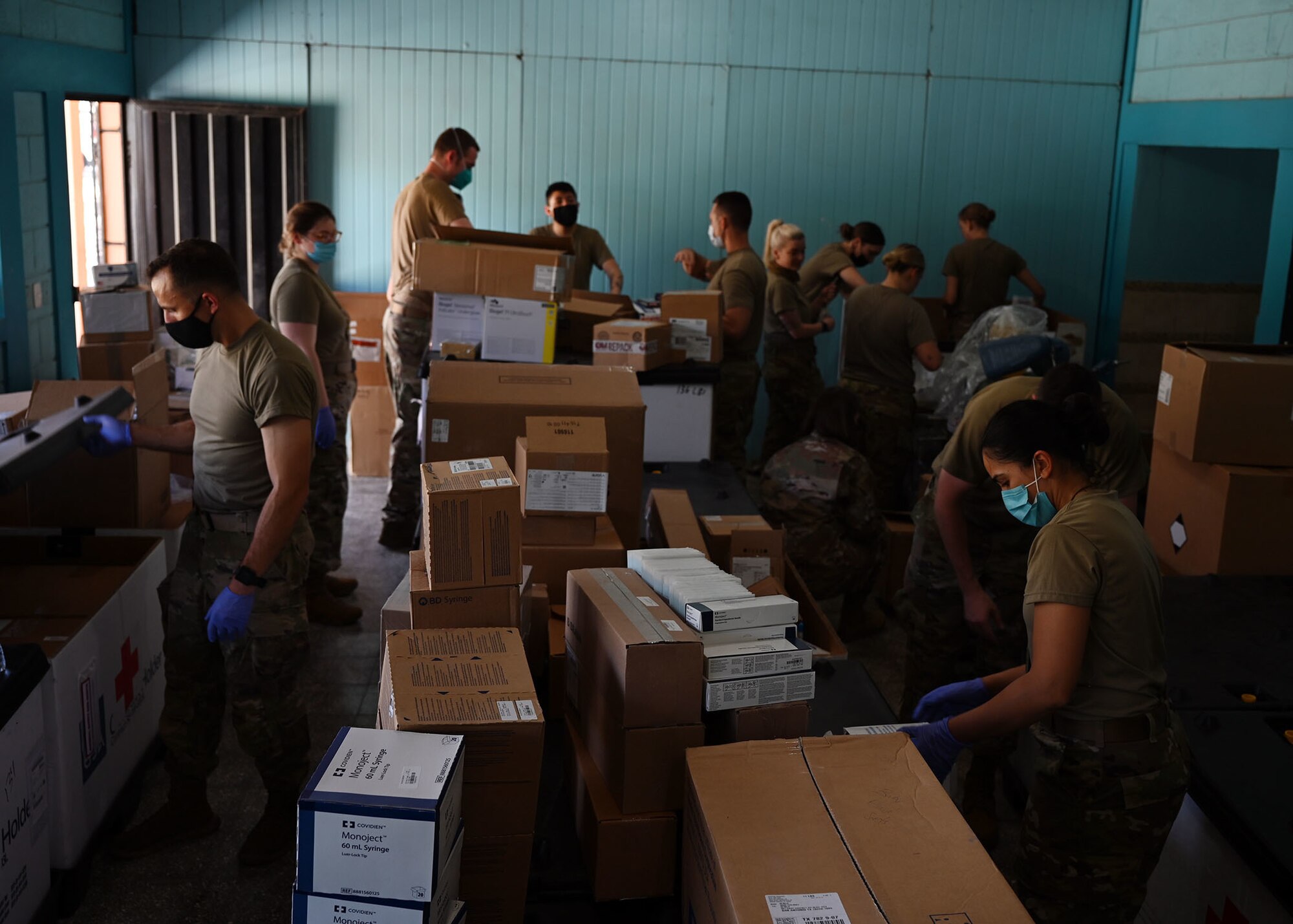 A team of U.S. military medics take inventory of supplies at Hospital del Sur in Choluteca, Honduras.