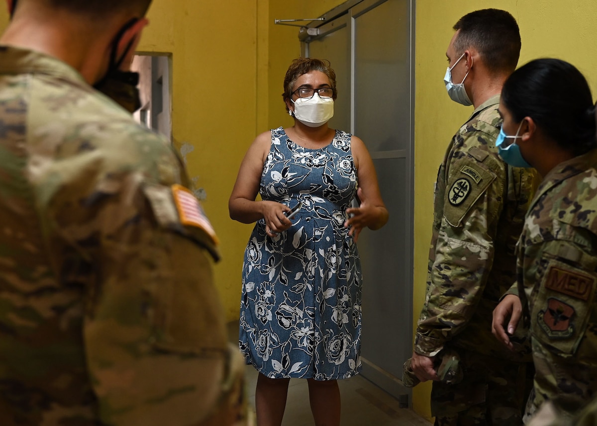 Maria Antonieta Castro, director at Hospital del Sur, briefs the team of U.S.military medics in Choluteca, Honduras.