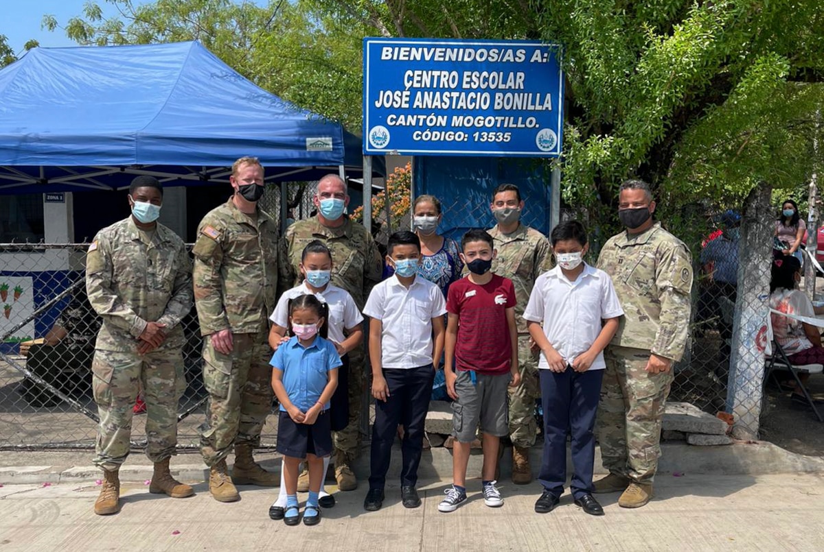 U.S. Army Soldiers with Joint Task Force-Bravo, Soto Cano Air Base, Honduras, donate construction materials to a school in Mogotillo, El Salvador.