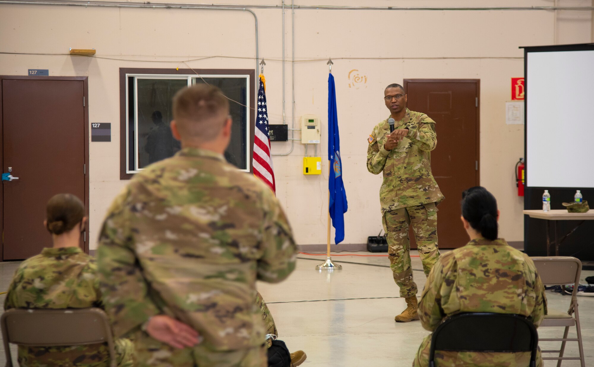 Command Sgt. Maj. Michael Gragg, Defense Health Agency senior enlisted leader, answers questions during a 49th Medical Group town hall, June 30, 2021, on Holloman Air Force Base, New Mexico. Gragg visited the 49th MDG to discuss the current state of the DHA and to address any areas of concern. (U.S. Air Force photo by Airman 1st Class Jessica Sanchez)