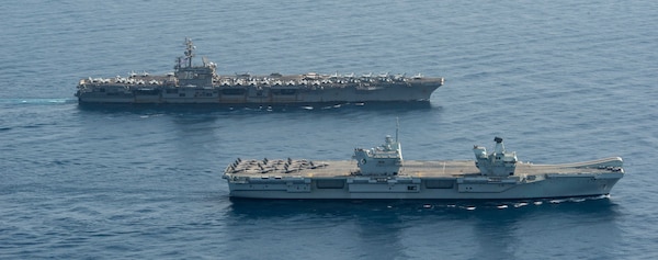 UK, Dutch and U.S. naval forces conduct an integrated at-sea exercise in the Gulf of Aden.