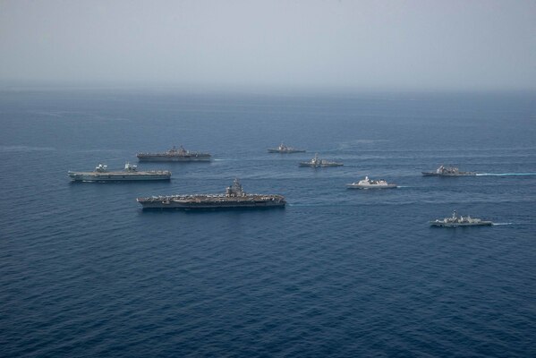 UK, Dutch and U.S. naval forces conduct an integrated at-sea exercise in the Gulf of Aden.