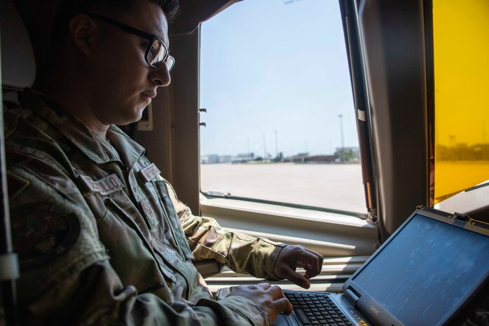 person operates a computer