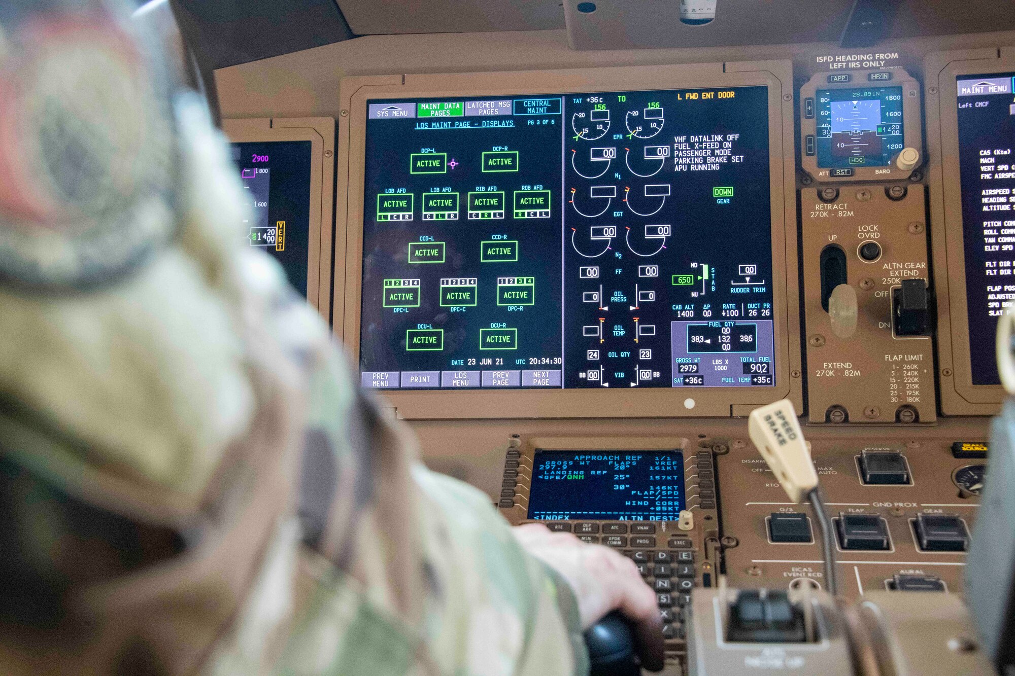 person adjusts controls of an aircraft