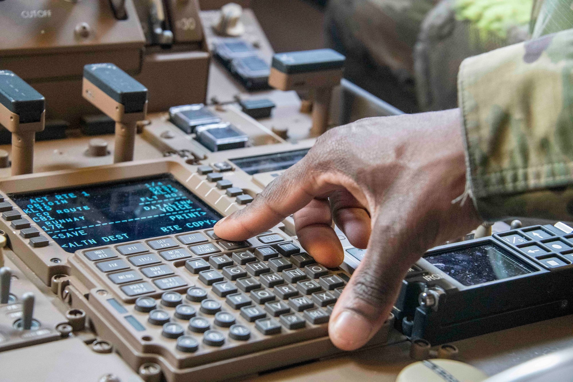 person presses a button on a panel