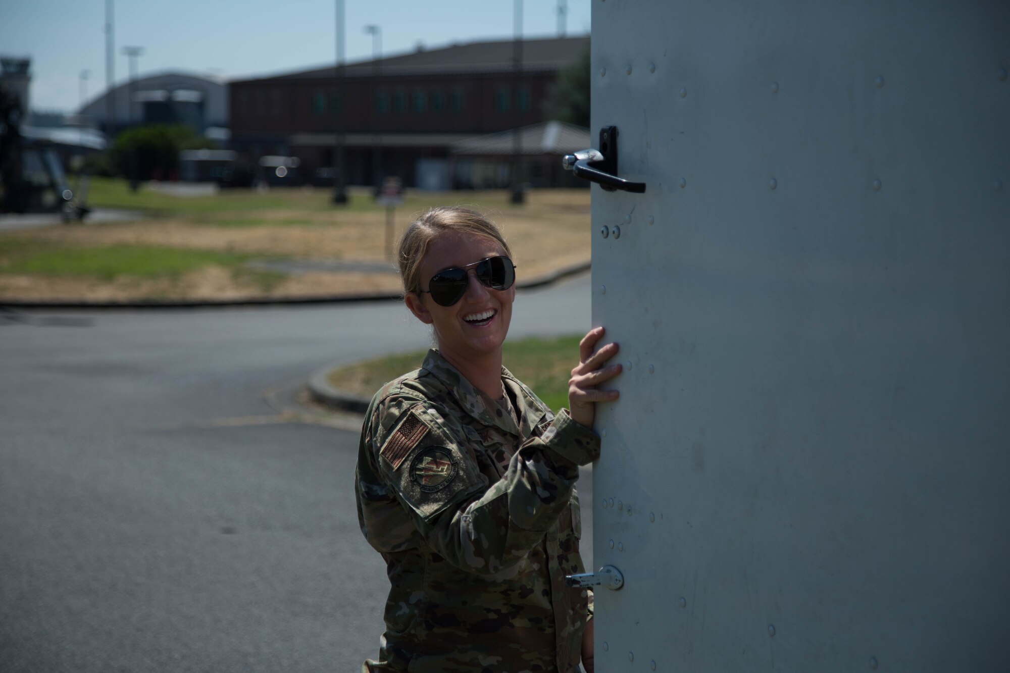 Airman opens door to depart for flight line.