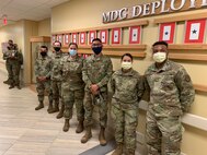 Group of medical personnel stand together