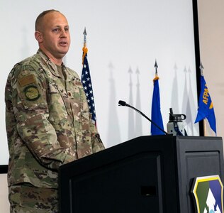 U.S. Air Force Maj. Karl Wiest addresses the crowd after taking command of the 3d Audiovisual Squadron.