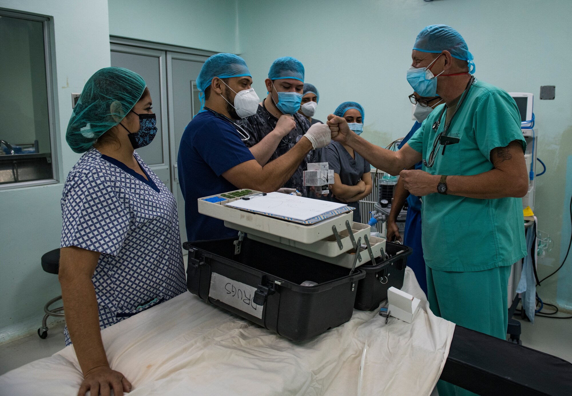 U.S. Army Col. William Kogl, right, a nurse anesthetist with the Forward Surgical Section at the Medical Element, Joint Task Force-Bravo, Soto Cano Air Base, Honduras, trains Salvadoran hospital staff and nursing students on a total intravenous anesthesia technique during a surgical readiness training exercise for Resolute Sentinel 2021 in La Unión, El Salvador, May 12, 2021. Resolute Sentinel 21 is a training opportunity with real-world benefits to increase JTF-B’s medical and operational readiness while helping local Salvadoran citizens.