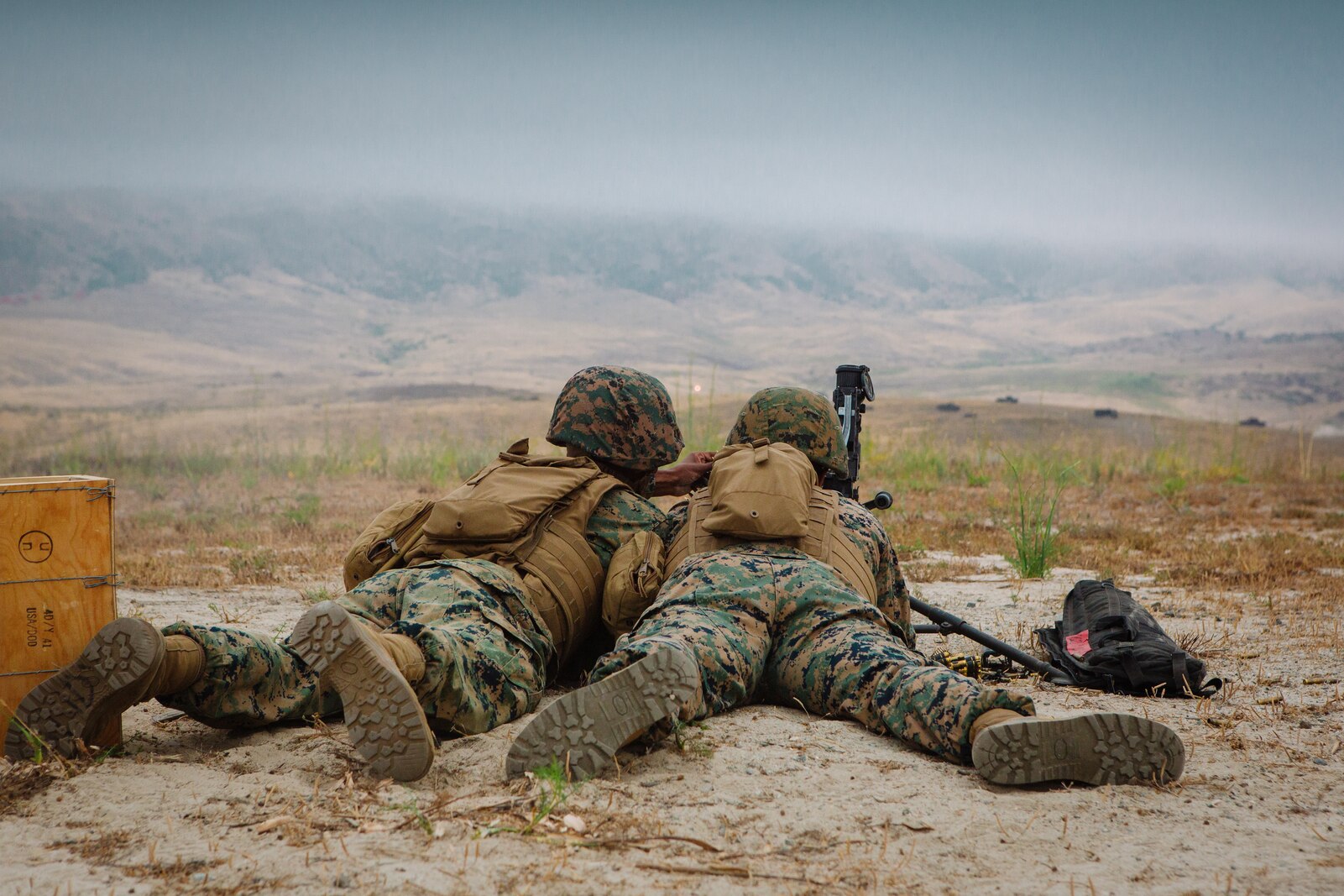 The Marines and Sailors participated in a live fire machine gun range to familiarize themselves with the weapon system as part of the Combat Skills Training School course.