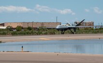 An MQ-9 Reaper from Creech Air Force Base, Nevada, lands at Holloman AFB, New Mexico.