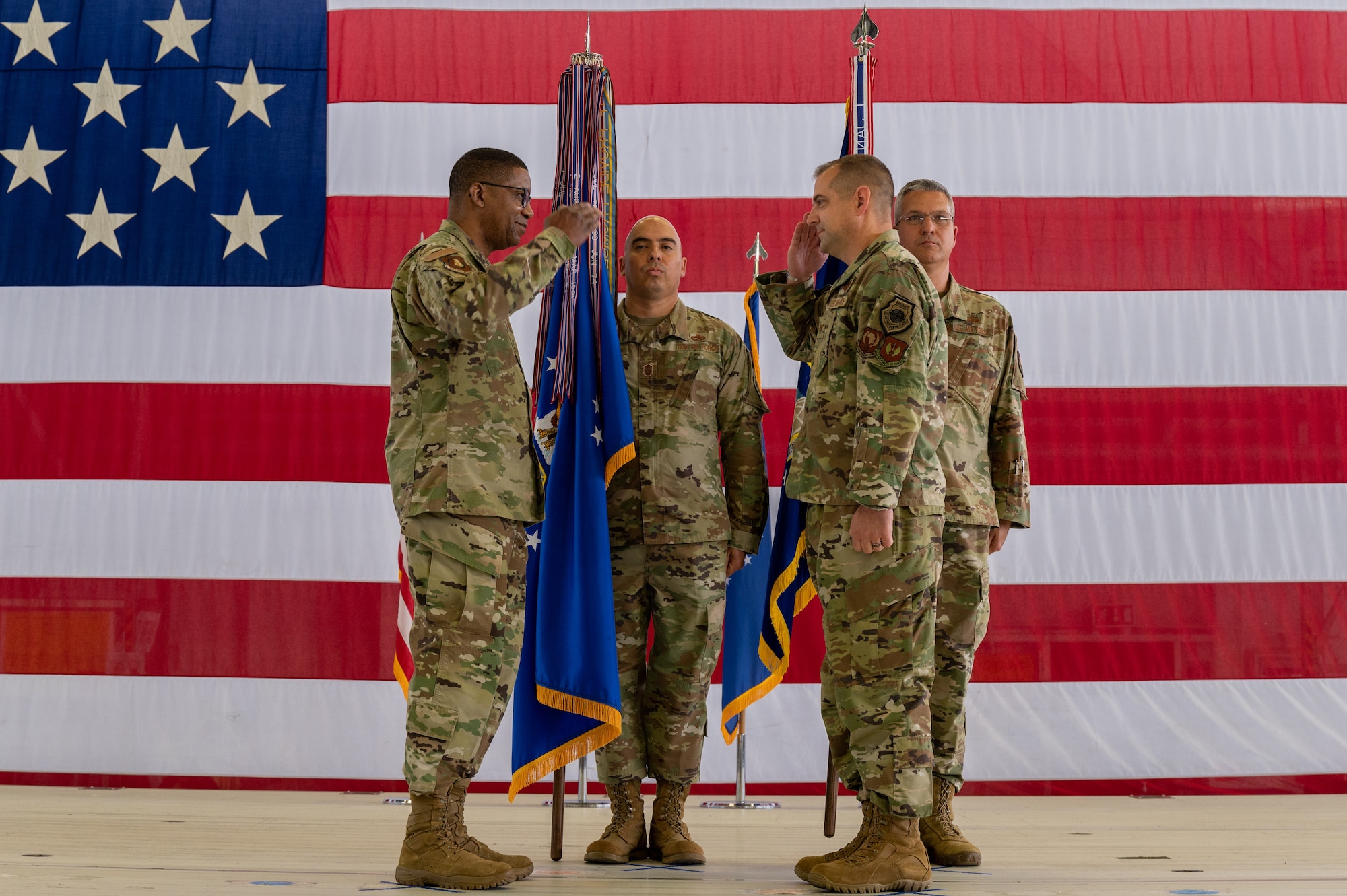 An officer saluting another officer.