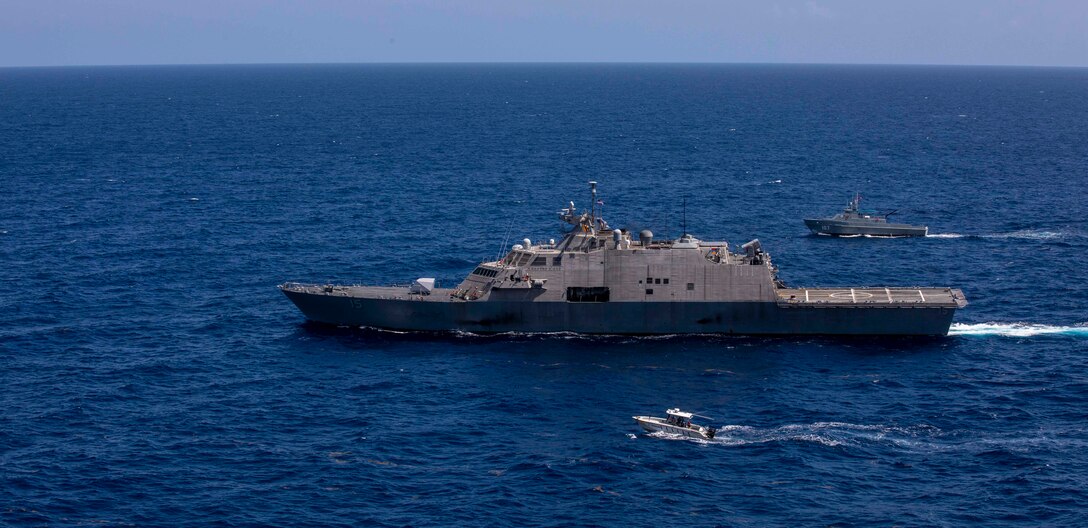USS Billings (LCS 15) conducts a passing exercise (PASSEX) with Dominican Republic navy Swiftship-110’-class patrol boat Canopus (GC 107) and Justice Boston whaler-class boat Nunke (LI 163), July 10.