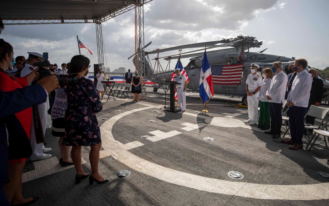 Cmdr. Brian A. Forster, commanding officer of the Freedom-variant littoral combat ship USS Billings (LCS 15), gives opening remarks during a reception on the flight deck, July 9, 2021.