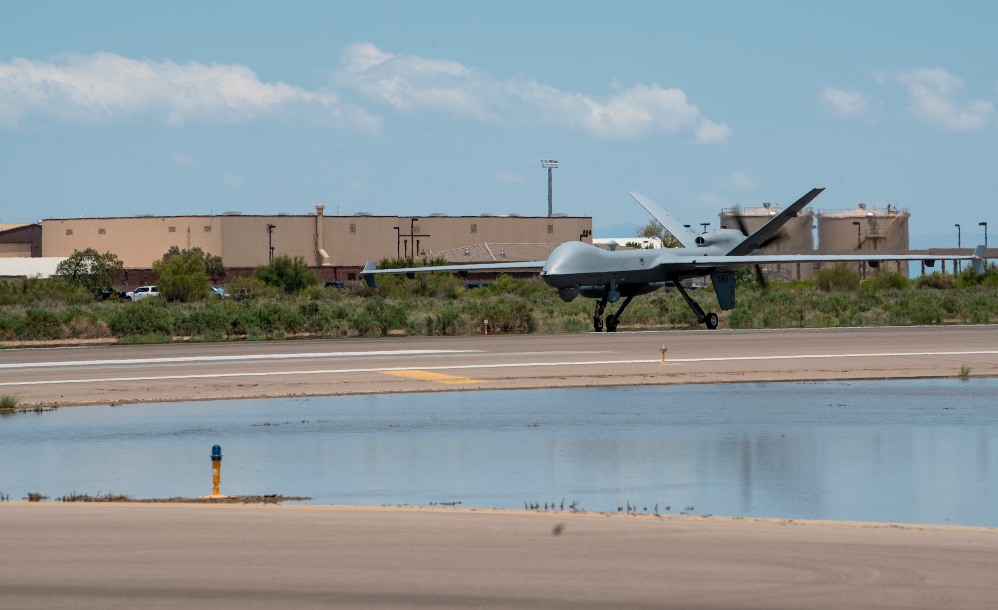 An MQ-9 Reaper from Creech Air Force Base, Nevada, lands at Holloman AFB, New Mexico.