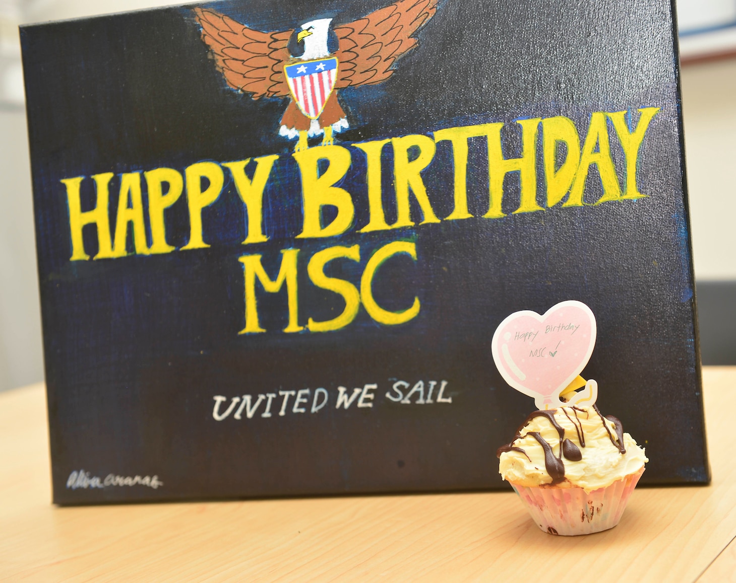 210709-N-UA460-003 SINGAPORE (July 9, 2021) Akira Aranas painted an original birthday card for Military Sealift Command, which celebrated 72 years of service to the Department of Defense, July 9. One of MSC's five commands, MSC Far East, took time to note the occasion. MSC FE ensures approximately 50 ships in the Indo-Pacific region, are manned, trained and equipped to deliver essential supplies, fuel, cargo, and equipment to warfighters, both at sea and on shore. As the U.S. Navy's largest forward-deployed fleet, 7th Fleet employs 50-70 ships and submarines across the Western Pacific and Indian oceans. U.S. 7th Fleet routinely operates and interacts with 35 maritime nations while conducting missions to preserve and protect a free and open Indo-Pacific Region. Military Sealift Command is the leading provider of ocean transportation for the Navy and the rest of the Department of Defense - operating approximately 125 ships daily around the globe. (U.S. Navy photo by Mass Communication Specialist 1st Class Gregory Johnson)